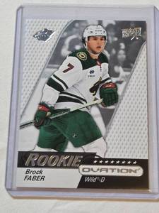 lot 100 image: Brock Faber Rookie 2023-24 Upper Deck Ovation #102 - Minnesota Wild Hockey Card