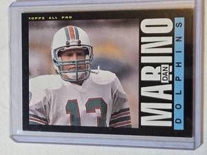 lot 104 image: Dan Marino 2nd Year 1985 Topps #314 - Miami Dolphins Football Card