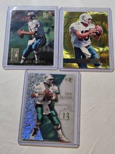 lot 105 image: Lot of 3 Dan Marino Premium Insert Football Cards Including Ultra Touchdown Kings and E-X2000