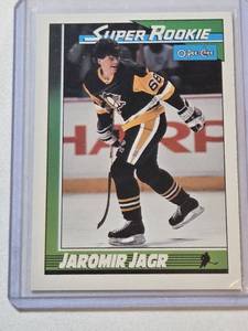 lot 152 image: Jaromir Jagr Rookie 1991 O-Pee-Chee Super Rookie #9 - Pittsburgh Penguins Hockey Card
