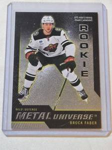 lot 183 image: Brock Faber Rookie 2023-24 Skybox Metal Universe Insert #R-21 - Minnesota Wild Hockey Card