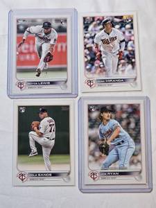 lot 185 image: Lot of 4 Minnesota Twins Rookie Baseball Cards Featuring Jose Miranda, Joe Ryan, Royce Lewis, and Cole Sands.