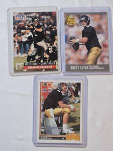 lot 188 image: Lot of 3 Brett Favre Rookie Football Cards from the Atlanta Falcons including Upper Deck, Pro Set, and Ultra Draft Picks.