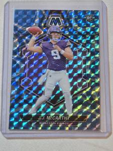 lot 212 image: J.J. McCarthy Rookie 2024 Panini Mosaic Blue Reactive Prizm #310 - Minnesota Vikings Football Card