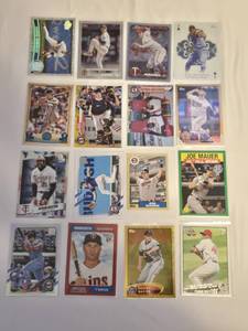 lot 226 image: Lot of 16 Minnesota Twins Baseball Cards Featuring Players like Joe Mauer, Justin Morneau, and Bert Blyleven with Special Editions and Inserts.