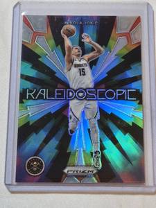 lot 231 image: Nikola Jokic 2023-24 Panini Prizm Kaleidoscopic Refractor Insert #8 - Denver Nuggets Basketball Card