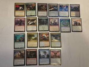lot 256 image: Lot of Magic The Gathering Rare Cards Including Fiery Justice, Lictor, and Emeria Angel