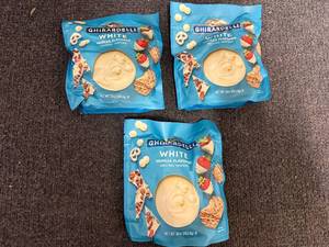 lot 216 image: 3 Bags Of Ghirradelli White Chocolate Melting Chips