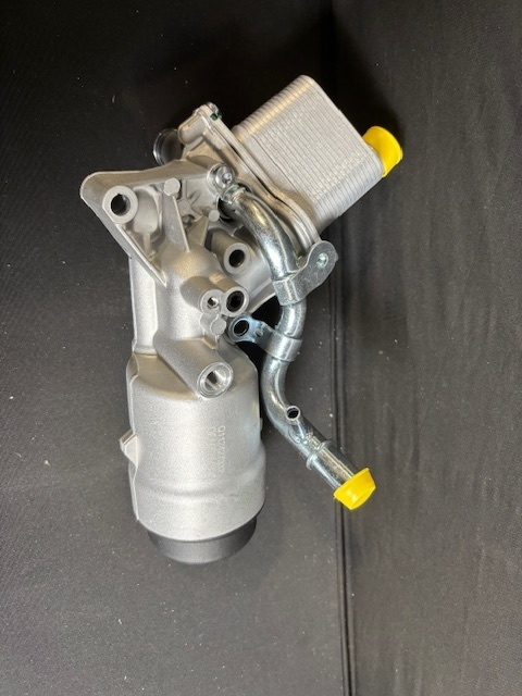 lot 6 image: Engine Oil Filter Housing - Aluminum Dual Port Assembly