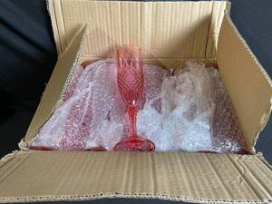 lot 277 image: Pink Glass Champagne Flute - Diamond-Cut Pattern, 9 in Tall