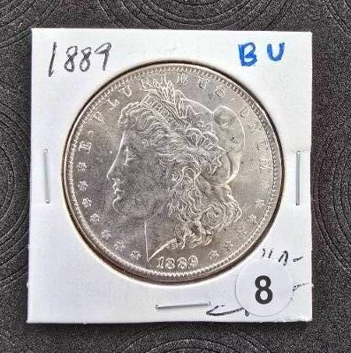 lot 8 image: 1889 BU Morgan Silver Dollar