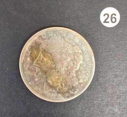 lot 26 image: Blue and Orange Toned AU Morgan Silver Dollar