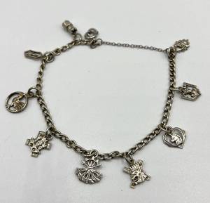 lot 38N image: Vintage Silver-Tone Charm Bracelet with 8 Unique Charms