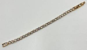 lot 55N image: Swarovski Gold-Tone Tennis Bracelet