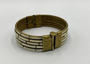 lot 75N image: Vintage Brass and White Inlay Hinged Bangle Bracelet