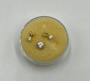 lot 83N image: 14k Gold Stud Earring and Two Small Diamond Pendants