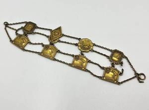 lot 102N image: Vintage Charm Bracelet with Swimming and Club Medals