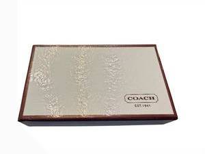 lot 158 image: COACH Dachshund Keychain - Red Enamel Coat