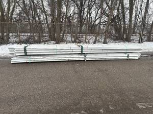 lot 9 image: JM EAGLE Lot of Approximately 170- 2 in. x 20 ft. PVC Sch 40 Belled End Pipe Retail Value of Approximately $2600