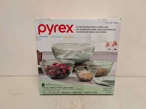 lot 82 image: PYREX COLORS GLASS MIXING BOWLS WITH LIDS 8PC.