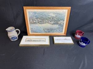 lot 12 image: St. Louis Art and Collectibles Set with Framed Prints, Mugs, and Carlisle Stoneware Pitcher