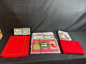 lot 15 image: Holiday Kitchen Collection with Placemats, Napkin Rings, Table Linens, Placemats and Mr. Food Cookbook
