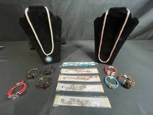 lot 75 image: Collection of Glass and Beaded Jewelry with Mexico-Marked Alpaca Sun Pendant