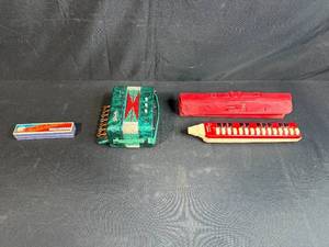 lot 149 image: Hohner Melodica-Alto with Case and Godlin Toy Accordion Set