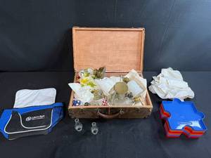 lot 215 image: Vintage Glass Oil Lamp Parts in Suitcase, Puzzle Trays, and Liberty Bank Pouch