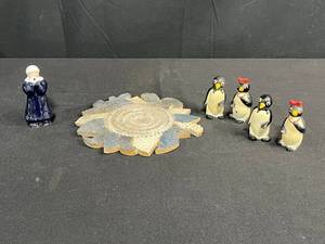 lot 239 image: Vintage Penguin and Eskimo Figurines Lot with Decorative Ceramic Plate