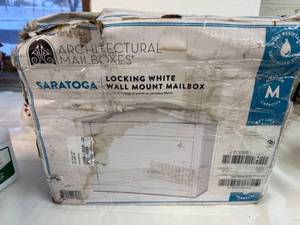 lot 38 image: SSS. Locking White Wall Mount Mailbox