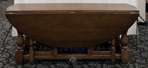 lot 49 image: Drop-Leaf Dining Table - Oval Top - Solid Wood with Turned Legs&nbsp