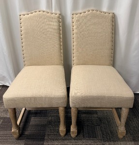 lot 72 image: Legacy Classic Furniture Dining Chairs - Linen Beige Upholstery with Nailhead Trim - Set of 2 (Matches lots 71 & 73)