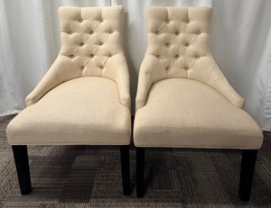 lot 77 image: Pair of Tufted Beige Accent Chairs with Nailhead Trim