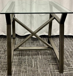 lot 87 image: Glass Top Coffee Table - Brushed Metal & X-Frame Base