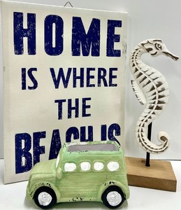 lot 401 image: Home Is Where The Beach Is Sign & Seahorse Sculpture & Green Toy Bus