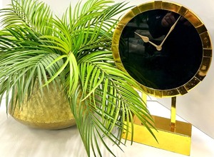 lot 403 image: Desk Clock - Gold Tone with Black Dial on Gold Stand with fern plant