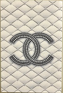 lot 9D image: Chanel Canvas Wall Art - Crystal-Embellished Chanel Logo on Quilted Pattern
