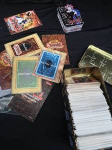 lot 38 image: YU-GI-OH CARDS AND TINS