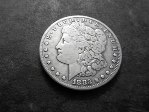 lot 8 image: 1883 CC Morgan Silver Dollar
