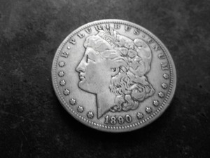 lot 18 image: 1890 CC Morgan Silver Dollar