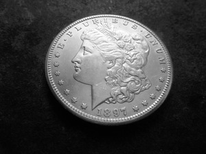 lot 33 image: 1897 S Morgan Silver Dollar