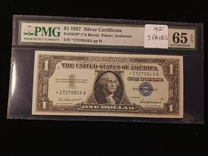 lot 101 image: 1957 Silver Certificate $1 � PMG Graded Gem Uncirculated 65 EPQ - TAX EXEMPT