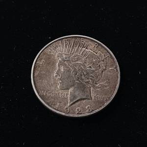 lot 115 image: 1923D Peace Silver Dollar � 90% Silver (nicks see pics) - TAX EXEMPT