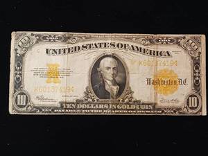lot 204 image: The 1922 $10 Speelman White Gold Certificate � rare and valuable � FR#1173 � gold colored seals Last year of large size.