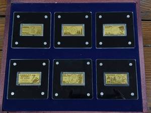 lot 305 image: Certificate of Authenticity � Americas History of Gold � .999% Pure Gold Ingot Collection � each bar weighs 1200 ounce � issued in 2022