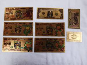 lot 330 image: Large Lot of .9999999 Gold Paper Currency with Certificate -  Florida Gold Back -Entire set of Teenage Mutant Ninja Turtles and More  See pics � Tax Exempt