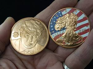 lot 335 image: Copper 1 ounce Bullion minted 2017 � 2 Total Coins one ounce each � Trump and Painted Walking Liberty � Taxable
