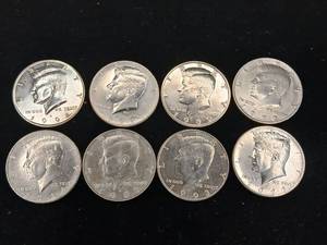 lot 359 image: Nice bright collection of Kennedy half dollars � Mixed years � Tax Exempt � 8 coins total
