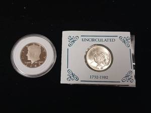 lot 370 image: Uncirculated Half Dollar Proofs � 2 coins � 1983 Kennedy � 1982 George Washington Commemorative 90% Silver Half Dollar � tax exempt